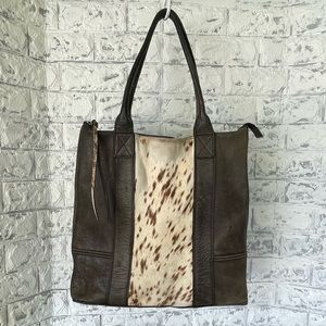 ALL SAINTS Co. Ltd.  Grey Leather Tote w/ hair-on-hide featured on the front.